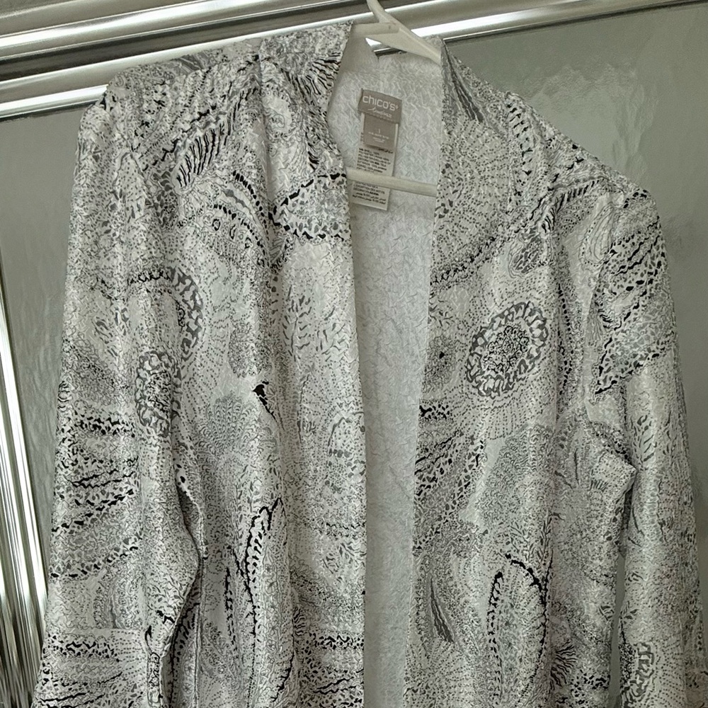 Chico's silver long front open top size 1 in chicos sizing. Worn once.